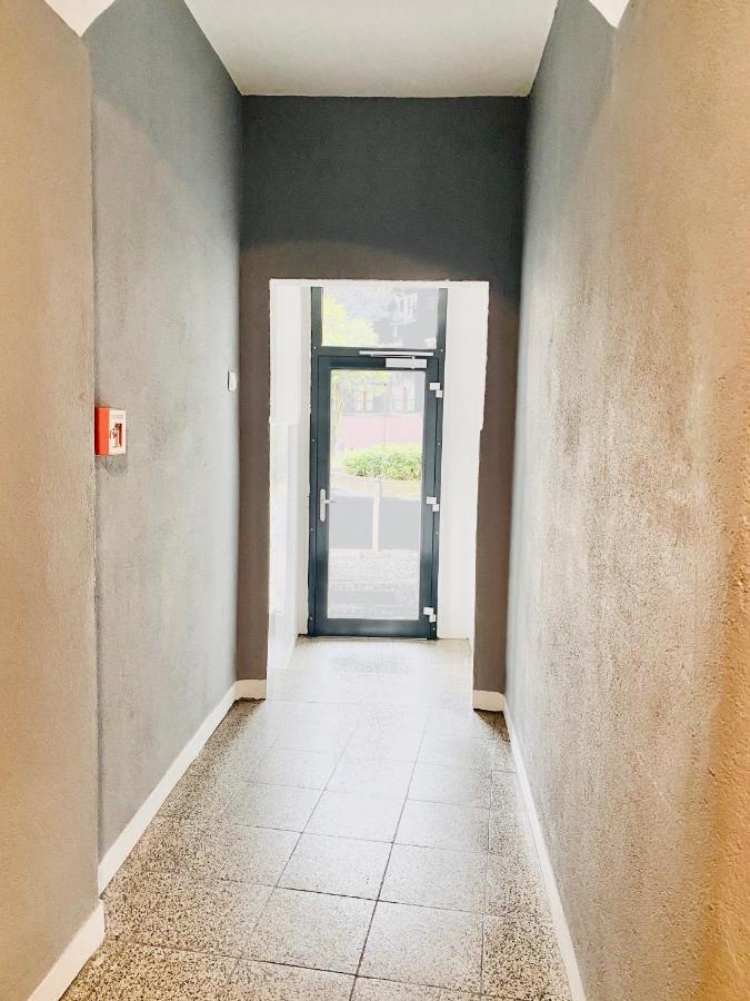 Tm Aparts Dortmund Bagian luar foto Entrance to the house