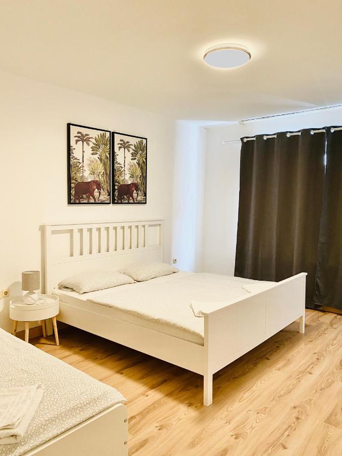 Tm Aparts Dortmund Bagian luar foto A bedroom