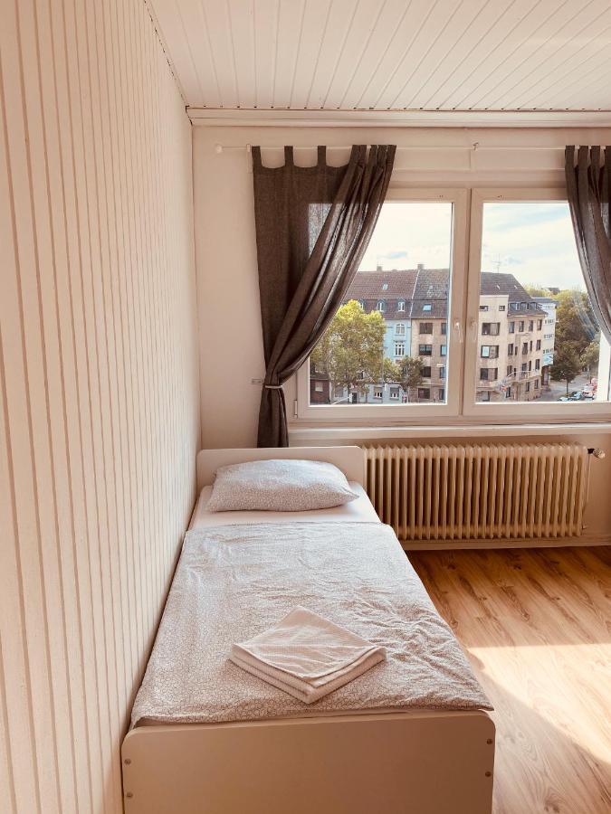 Tm Aparts Dortmund Bagian luar foto A single bed
