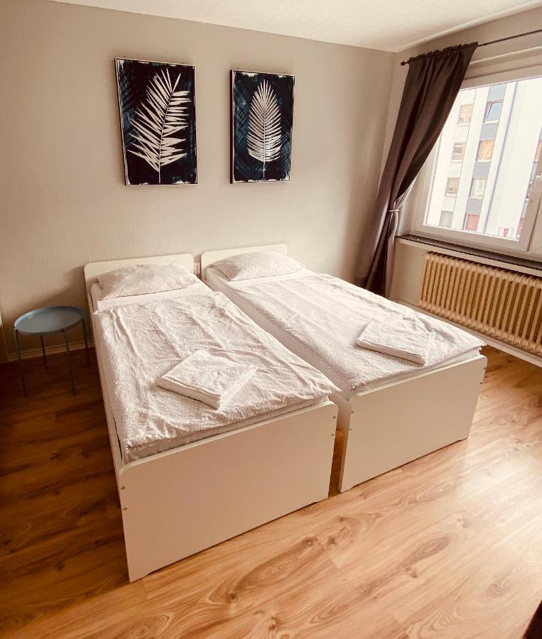 Tm Aparts Dortmund Bagian luar foto A room at the hostel